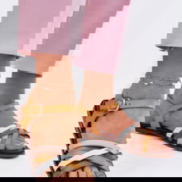 Moteryškos geltonos odinės basutės su pintais dirželiais Sergio Leone