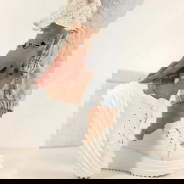 Moteriški sportbačiai ant platformos iš natūralios odos Filippo